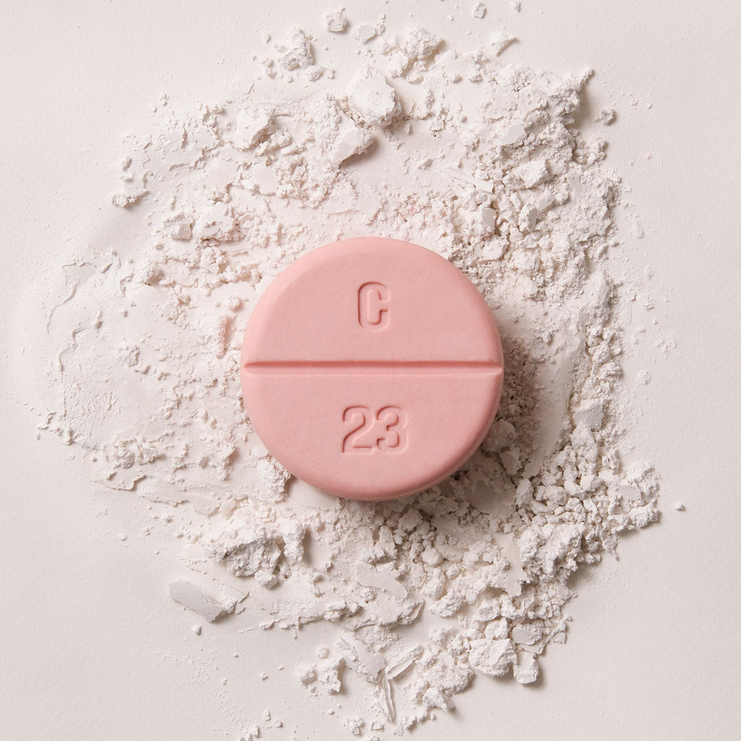 a pink color soap on calamine powder, look like a tablet