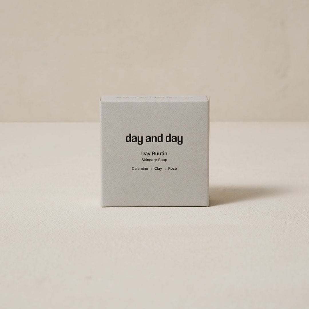 The gray color uncoated paper box, brand name 'day and day' is on front of it.